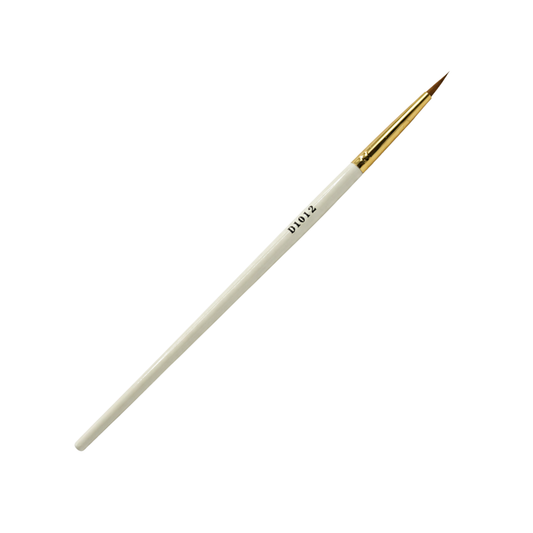 A fine detail nail art brush with an off-white handle, a gold ferrule, and a fine brown bristle tip, shown diagonally on a plain white background.