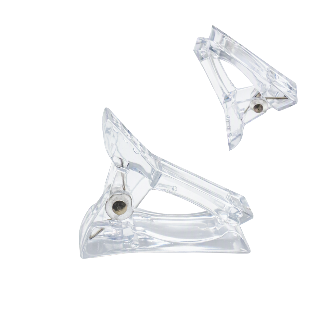 Two Clear polygel clips from different angles on a white background