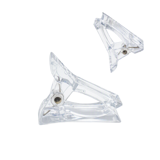 Two Clear polygel clips from different angles on a white background