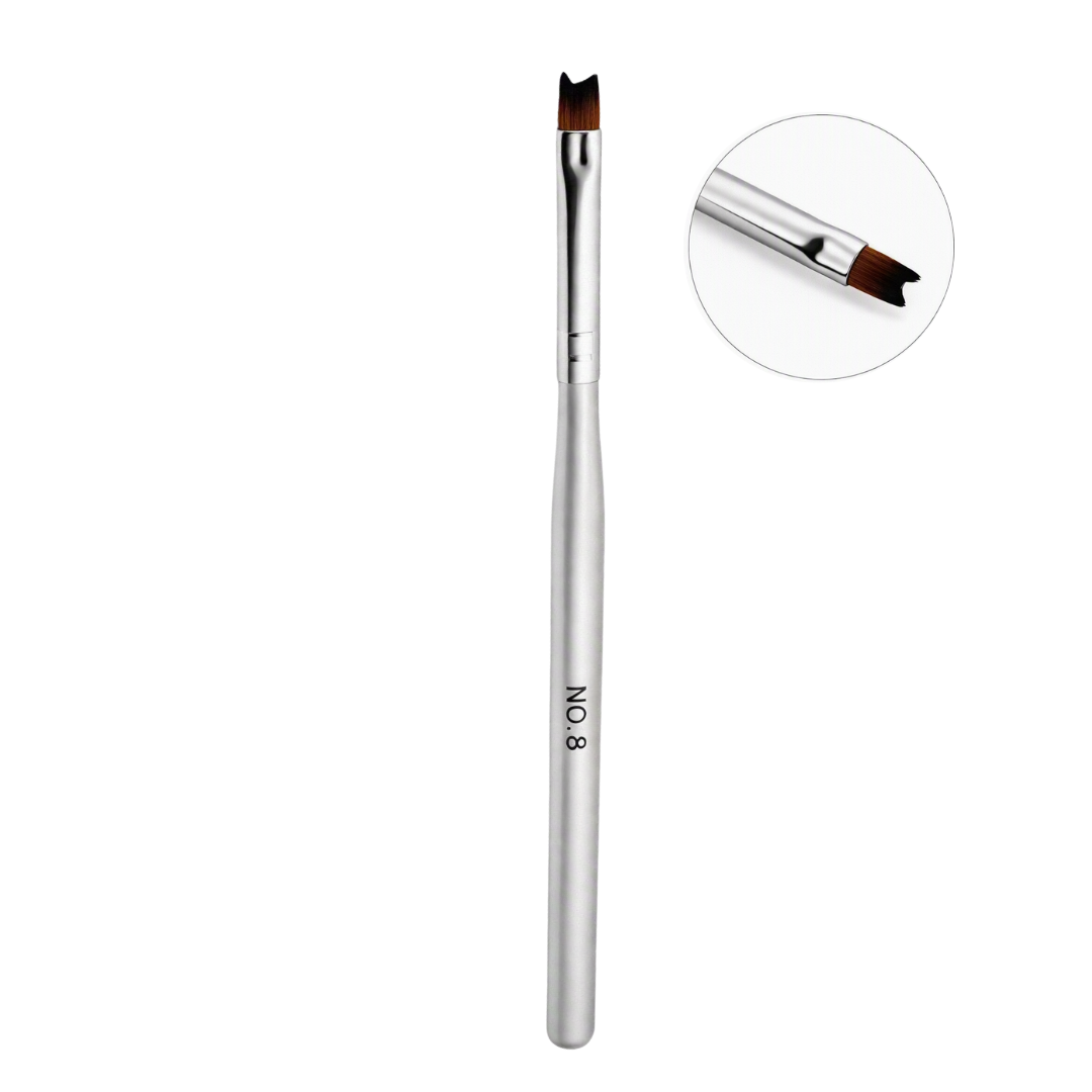 A silver nail brush with a red brown bristle tip, shown vertically on a white background with a circular inset detail of the brush head.