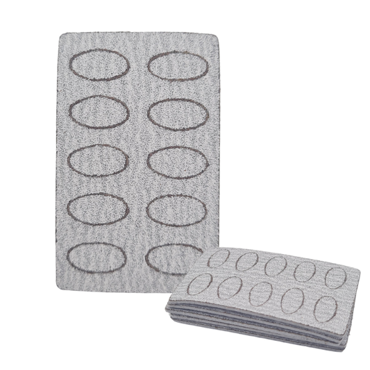 A gray textured grit pad sheet with ten oval cutouts, shown with one grit sheet standing upright and a folded stack of matching grit sheets in front, on a plain white background.