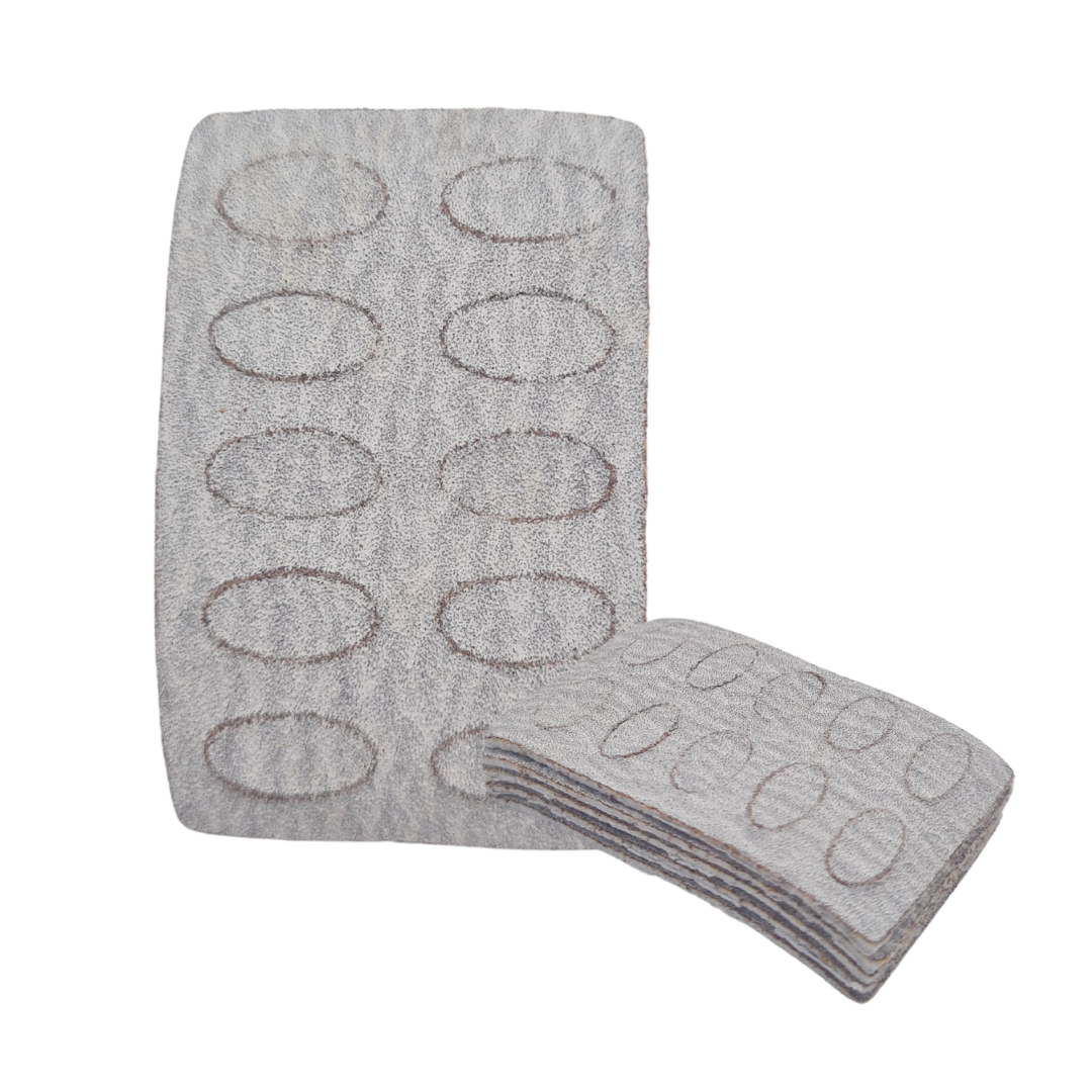 A gray textured 150grit pad sheet with ten oval cutouts, shown with one grit sheet standing upright and a folded stack of matching grit sheets in front, on a plain white background.