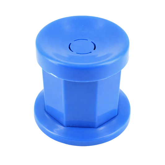 A bright blue plastic Dappen dish used for holding small amounts of acrylic liquid/monomer.