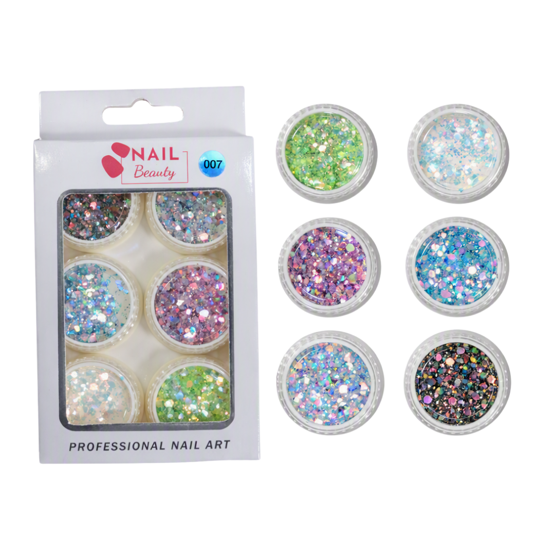 Six small round jars of holographic glitter nail art powder displayed next to their white retail packaging box. The glitter comes in a variety of colors including green, pink, blue, purple, and black, with some showing an iridescent finish.