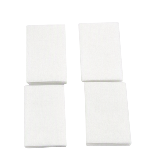 Four plain white non woven lint free nail wipe pads arranged in a 2-by-2 grid on a white background.