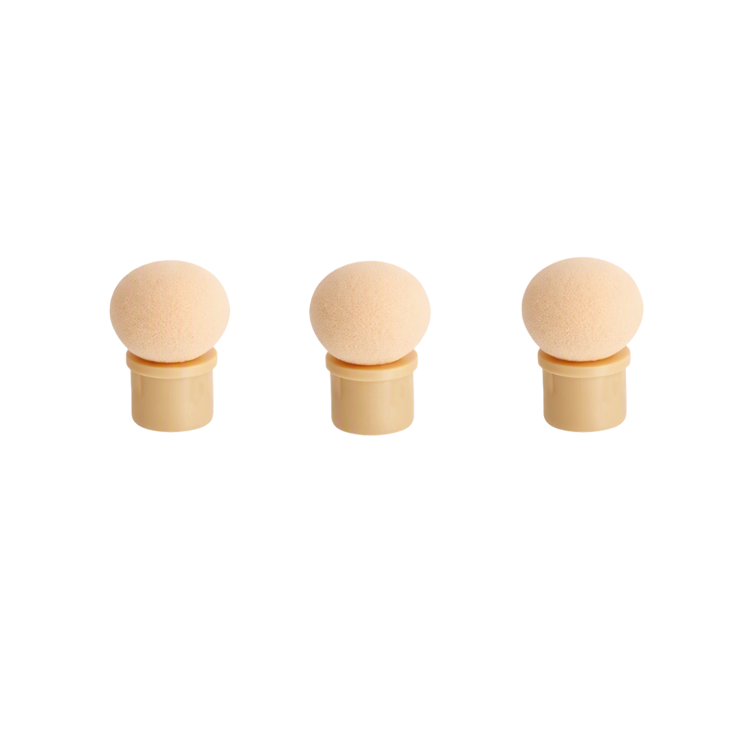 Three small nail art sponge applicators with round beige foam heads and cylindrical tan handles, arranged horizontally on a plain white background.