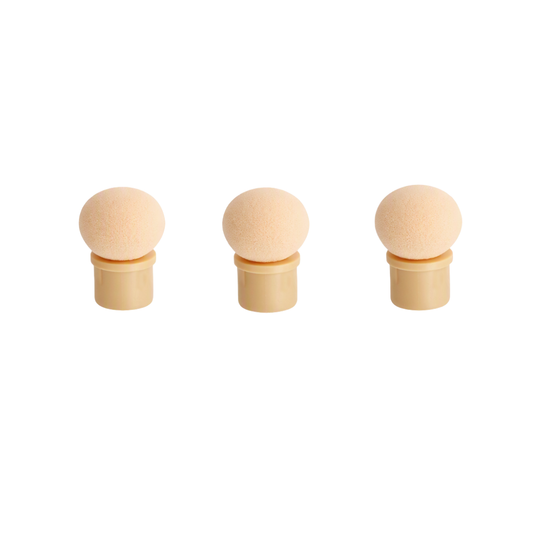 Three small nail art sponge applicators with round beige foam heads and cylindrical tan handles, arranged horizontally on a plain white background.