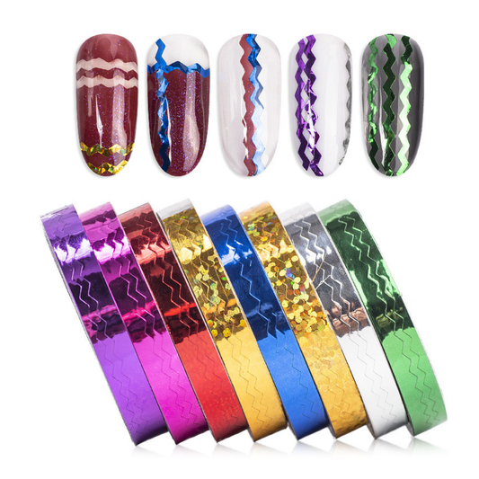Six metallic zigzag nail art striping foil strips in purple, pink, red, blue, gold, silver, and green, displayed below six manicured nail tips demonstrating their use for nail art designs.