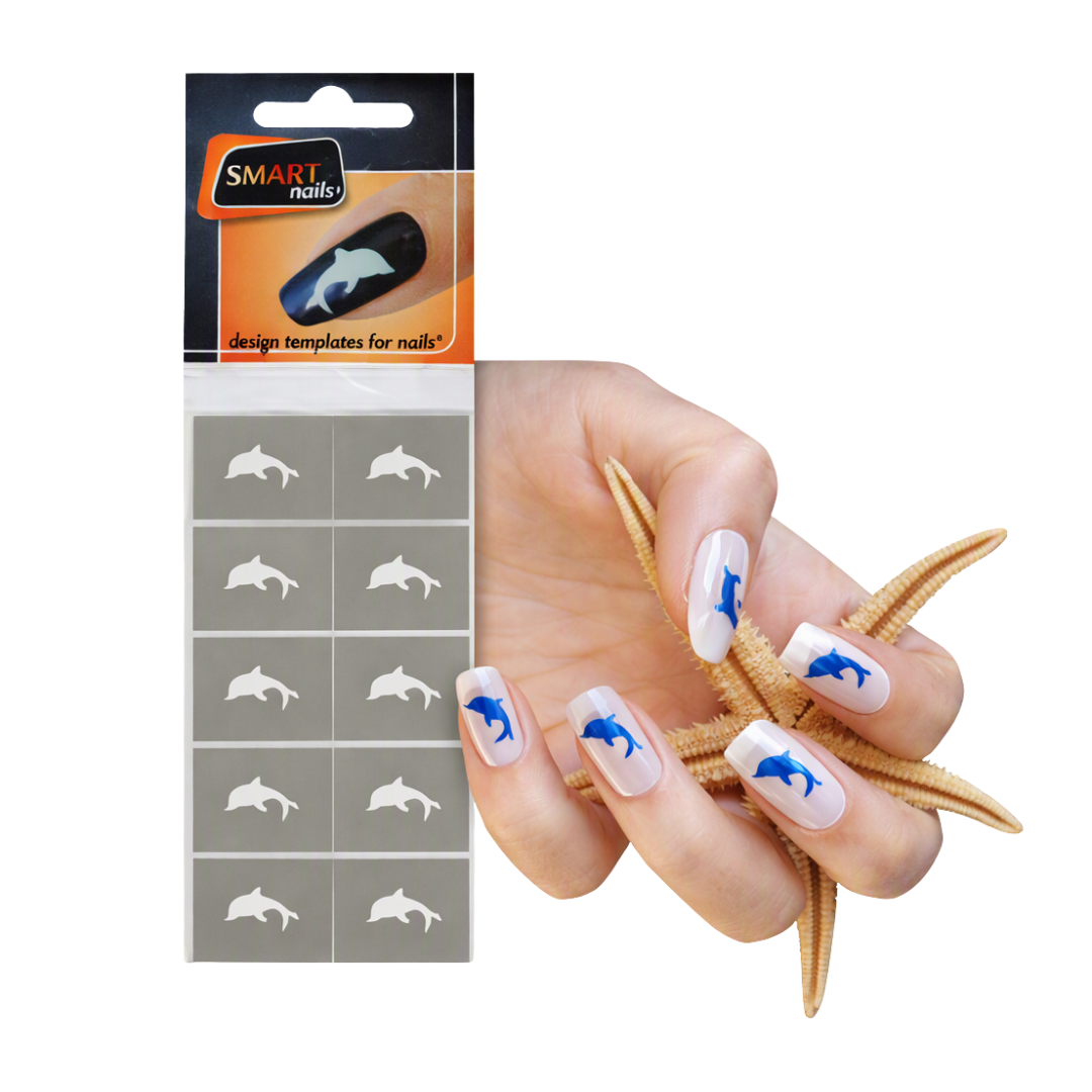 Nail design template stickers by Smart Nails shown with a hand modeling the result. The package contains white dolphin-shaped nail templates, and the hand displays white nails decorated with blue dolphin designs, styled with a starfish prop on a white background.