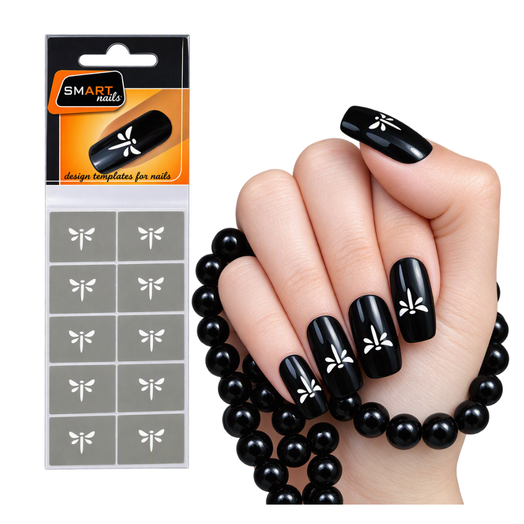A hand with glossy dark black nails decorated with white dragonflies, shown next to the retail package for SMART nails star design templates on a white background.