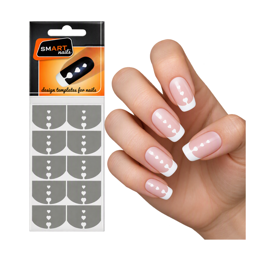 A hand with French manicure showing white heart-patterned nail templates, next to the retail packaging labeled SMART nails.