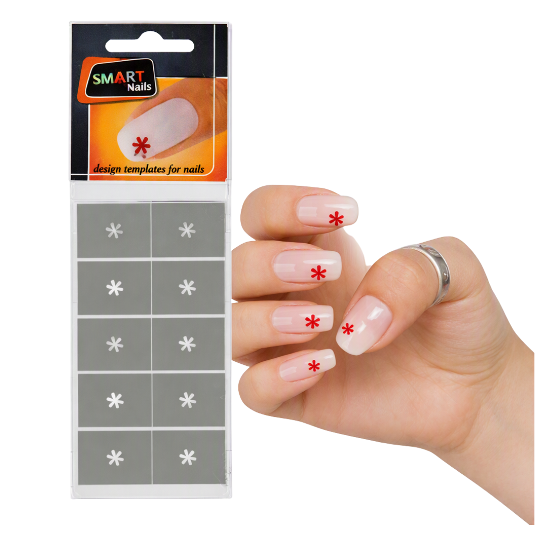 SMART Nails design template set for manicure, showing a retail package of gray square templates with white and red snowflake designs on the left, and a hand with sample nails decorated with red and white snowflakes on the right, against a white background.