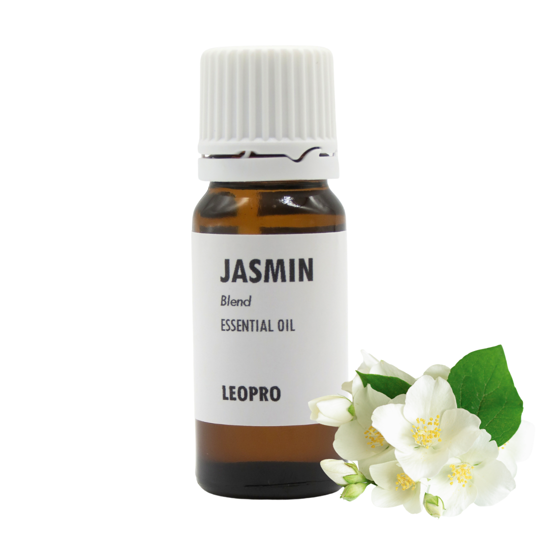 A bottle of LEOPRO Jasmin Blend essential oil with a white cap and white label, shown next to white jasmine flowers and green leaves on a white background.