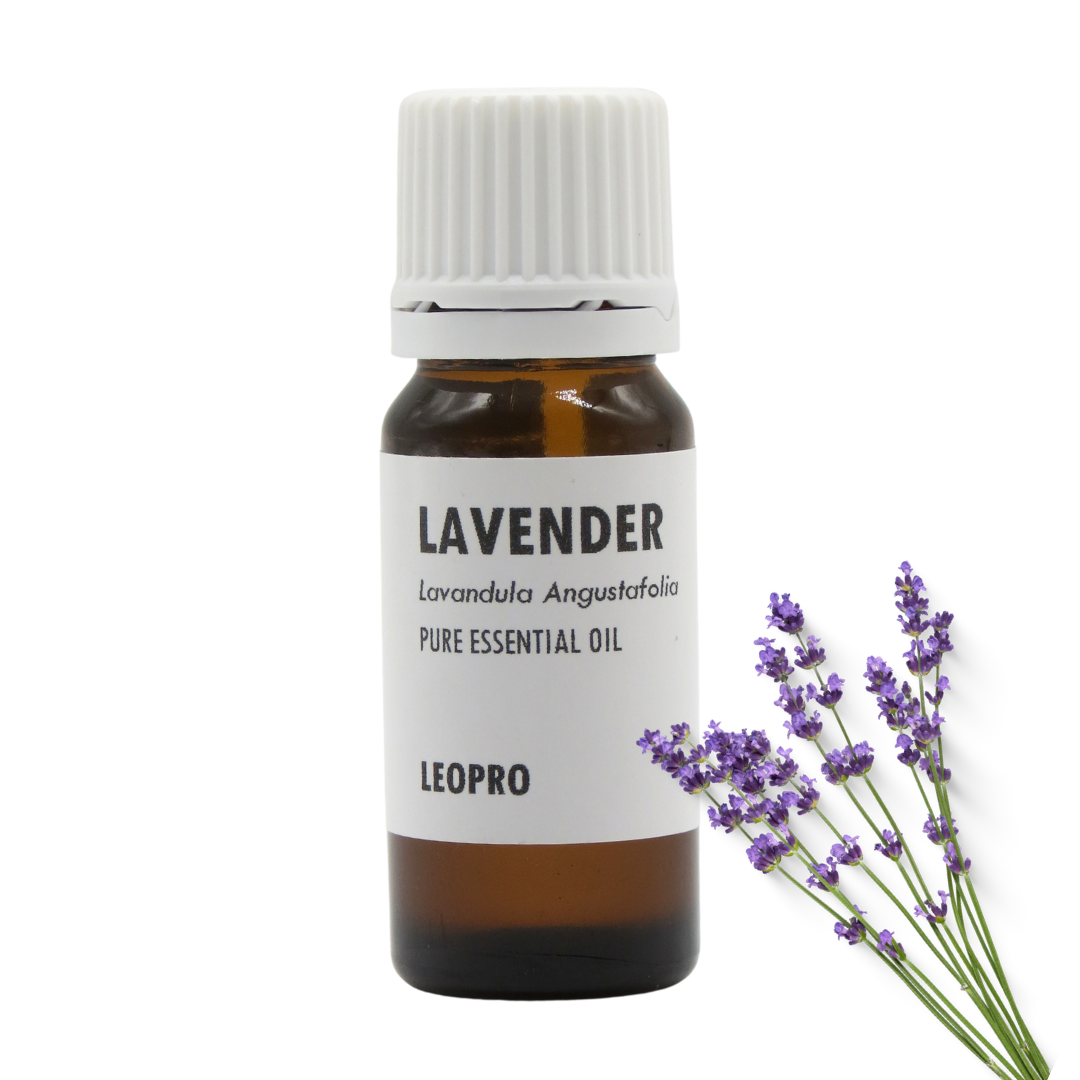 A bottle of LEOPRO Lavender Pure Essential Oil with an amber glass bottle, white cap, and white label, shown next to a sprig of purple lavender on a white background.