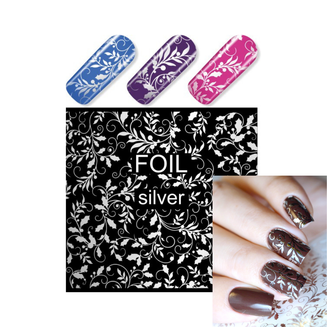 Silver foil nail art with a white floral scroll pattern on a black background, shown with three sample nail tips in blue, purple, and pink, and a hand displaying brown nails with the foil design applied.