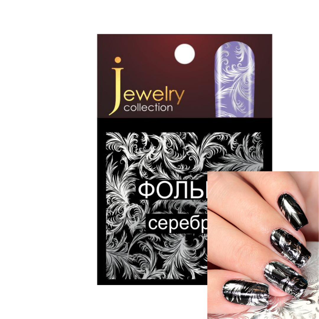 Jewelry collection silver foil nail art sheet with an ornate baroque scroll pattern, shown alongside a hand displaying the black and silver patterned nail art.
