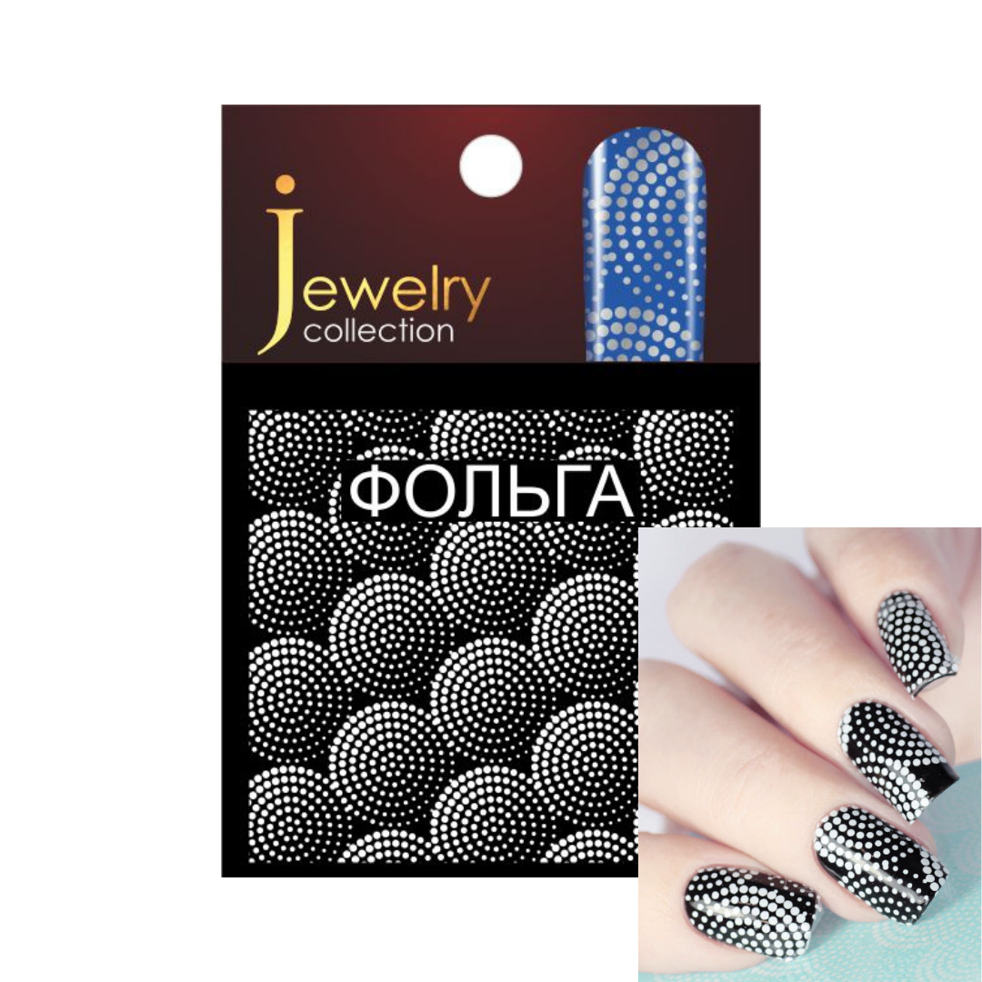 Jewelry collection brand nail wrap or nail sticker sheet with a black and white dotted circular pattern, shown on its card packaging with a hand sample of the same design on fingernails.