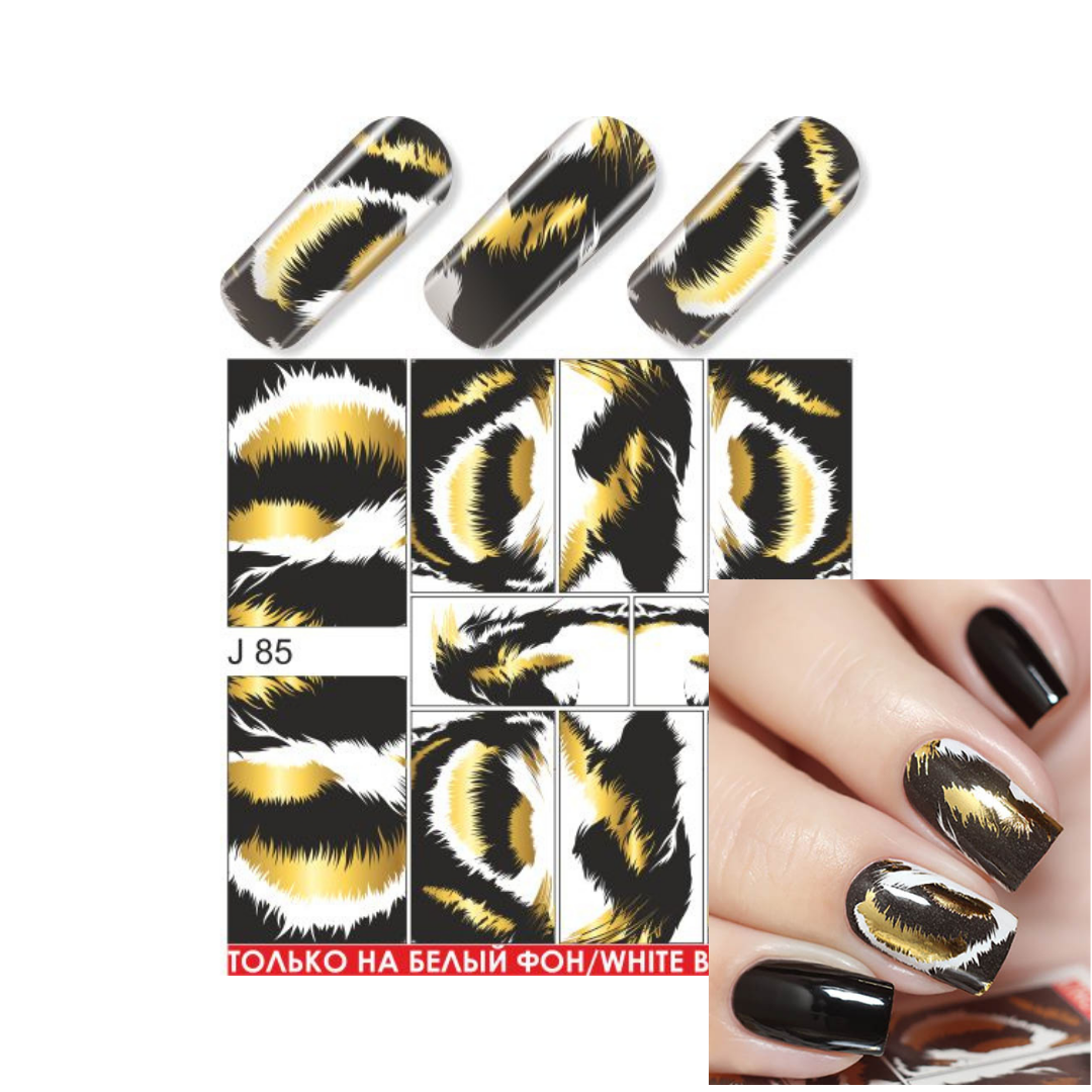 Nail art pattern sheet showing a black, white, and gold abstract brushstroke design, with three sample nail tips at the top and a hand inset at the bottom right demonstrating the manicure on fingernails.