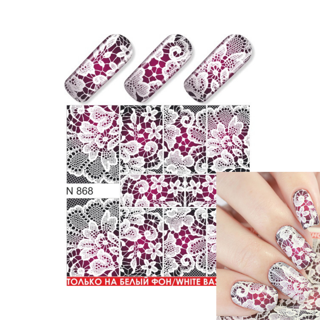 Nail art water slider sheet with floral lace pattern in white and deep magenta, shown alongside three sample nail tips and a hand demonstrating the applied design. Text reads 'N 8668' and 'ТОЛЬКО НА БЕЛЫЙ ФОН / WHITE ONLY'.