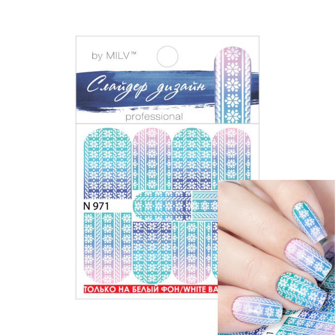 Nail art sticker sheet by MILV 'Snowdrift design' in shade N 971, featuring blue, purple, and pink winter-themed patterns, shown next to a hand with matching painted nails.