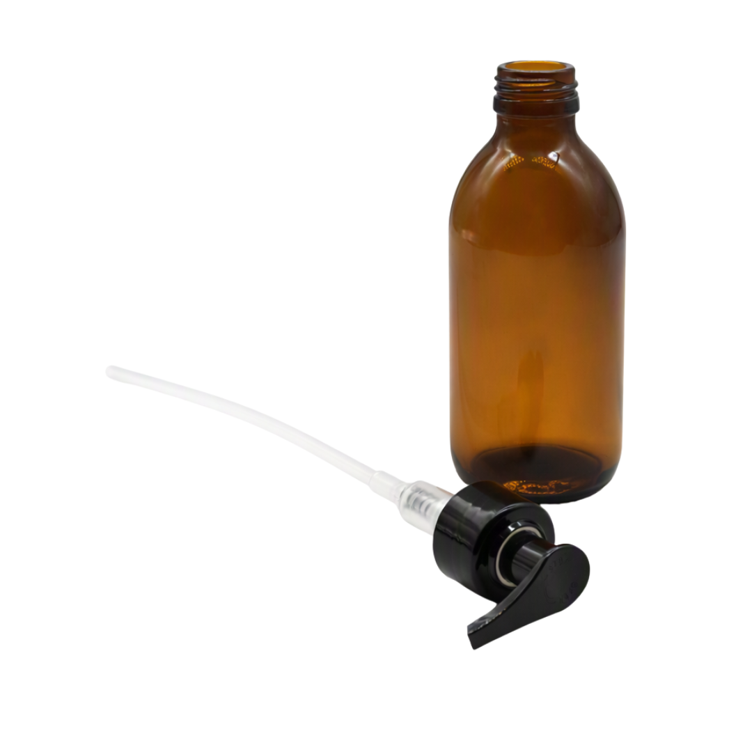 An amber glass bottle with a black and clear plastic pump dispenser, shown on a plain white background.