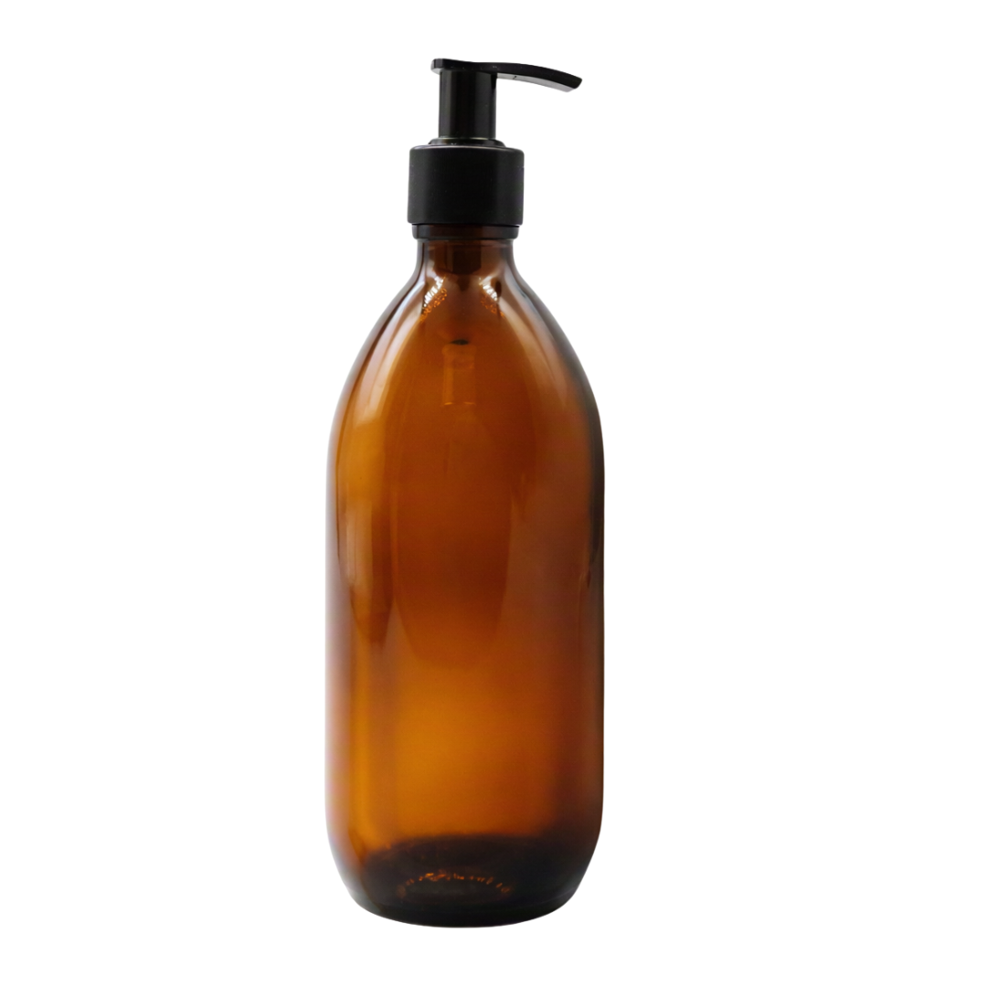 An empty amber glass bottle with a black plastic pump dispenser, shown against a plain white background.