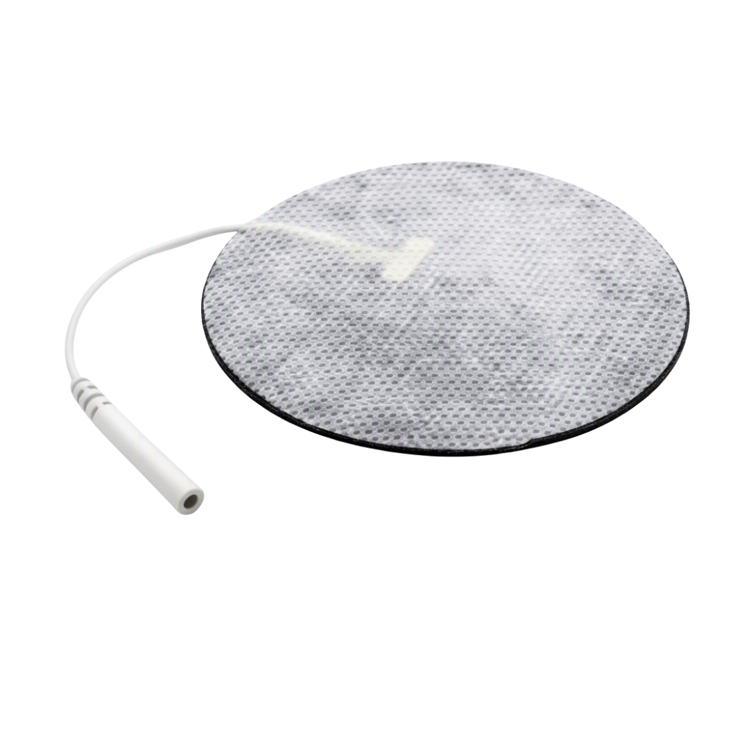 A circular electrode pad with a textured gray and white surface, connected to a white cable with a connector, shown on a plain white background.