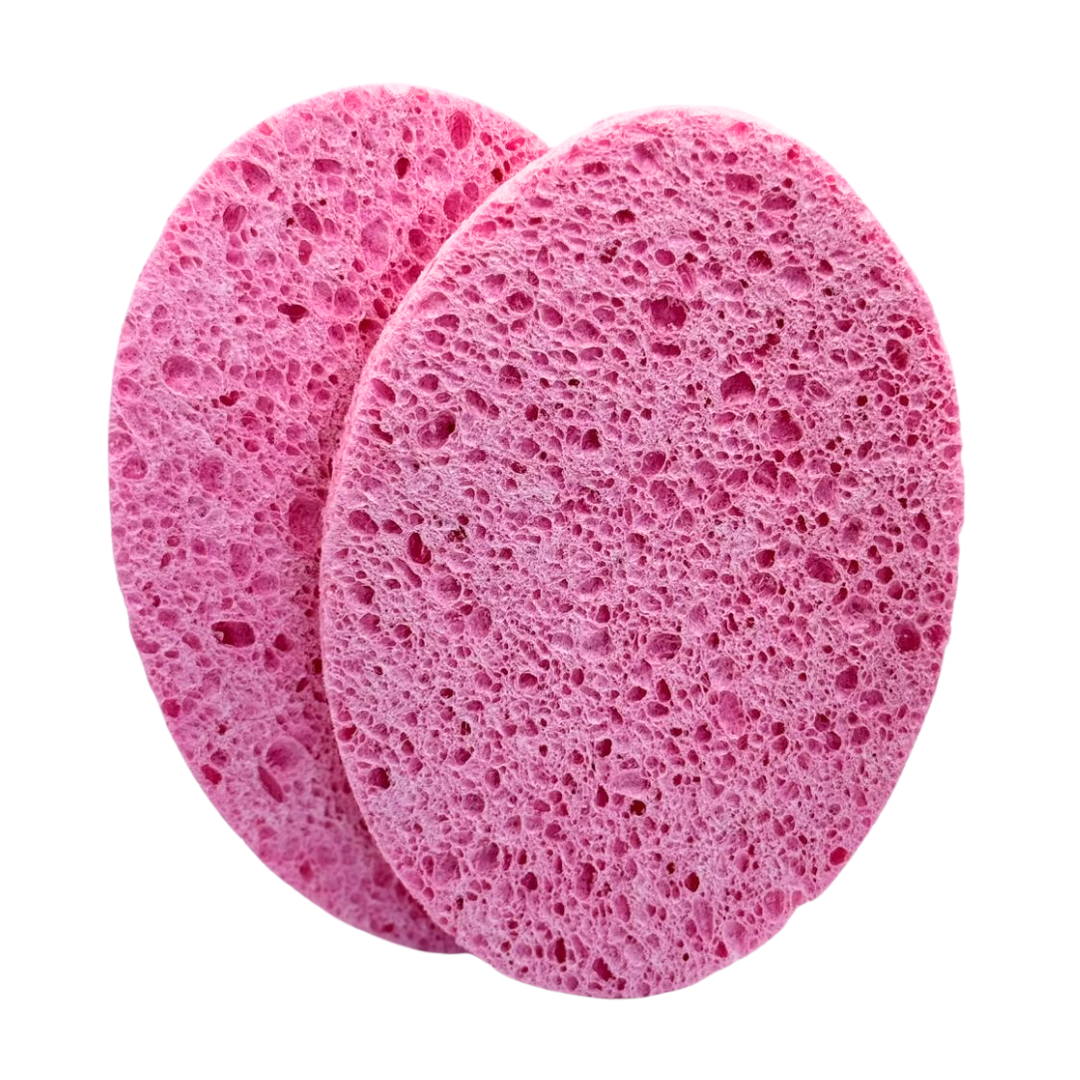 F001C Body Wash Sponges Pair for removal of body scrub and mud wraps | Two round pink body sponges with a porous sponge texture, overlapping on a solid white background.