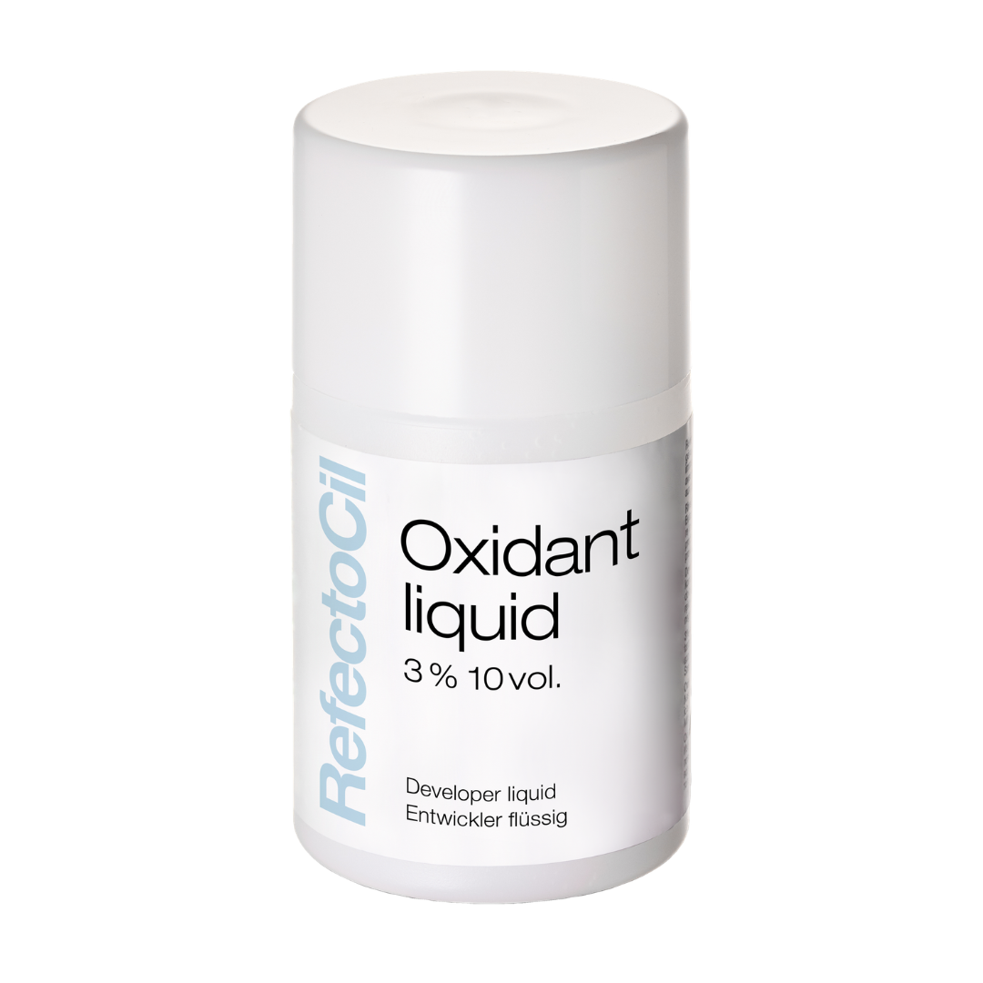 A white cylindrical bottle of RefectoCil Oxidant liquid 3% 10 vol. developer liquid, shown on a clean white background.
