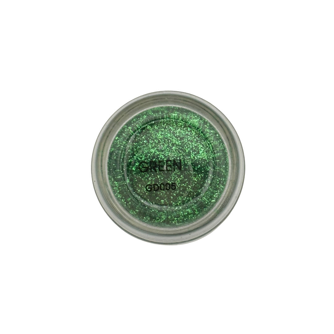Green glitter acrylic powder in a small round container on a white background