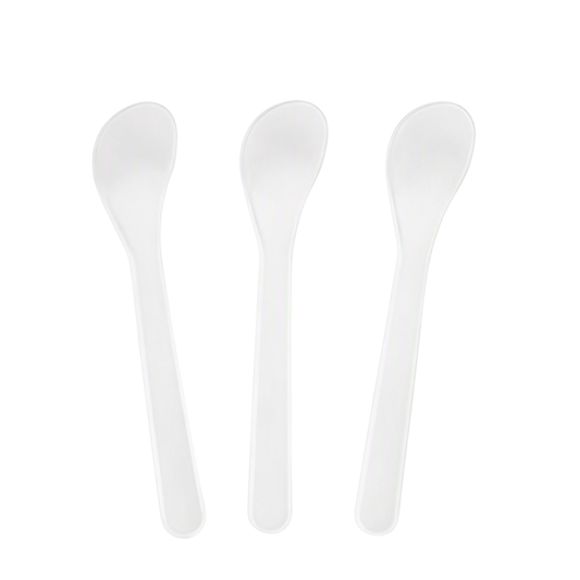 Three white plastic spoon spatulas arranged vertically side-by-side on a plain white background.