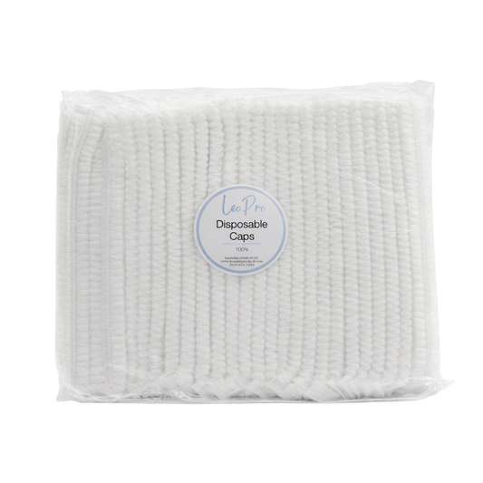 A packaged stack of white textured disposable caps, sealed in clear plastic with a circular blue and white Leo Pro label in the center, on a white background.