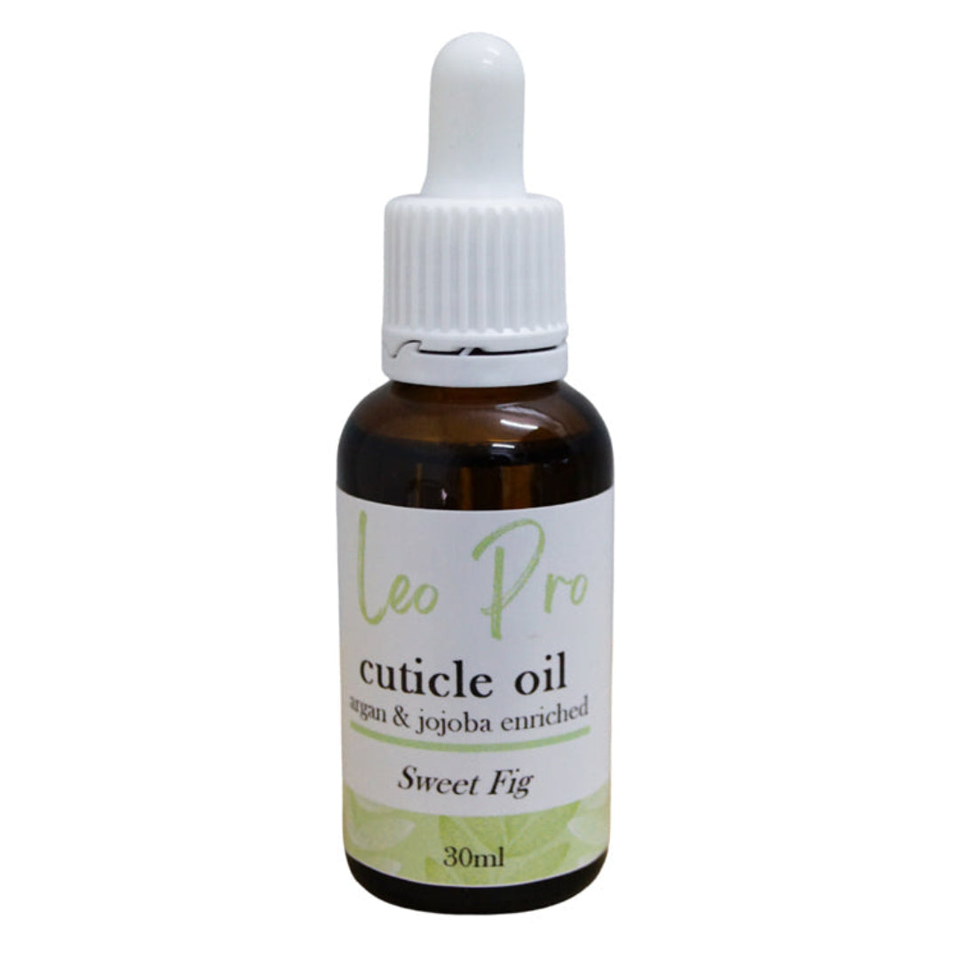 A 30ml amber glass dropper bottle of Leo Pro Cuticle Oil in the 'Sweet Fig' scent, featuring a white label with green accents and a white dropper cap, set against a plain white background.