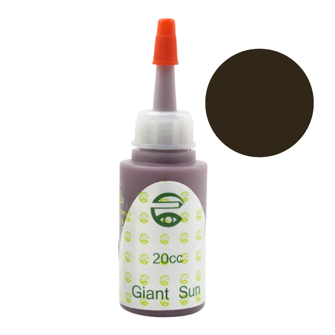 A bottle of Giant Sun UV pigment permanent makeup ink in the color 'Giant Sun' (a very dark brownish-black), featuring a white label with green text and a white cap with an orange nozzle tip. A circular color swatch of the same dark color is shown next to the bottle on a white background.