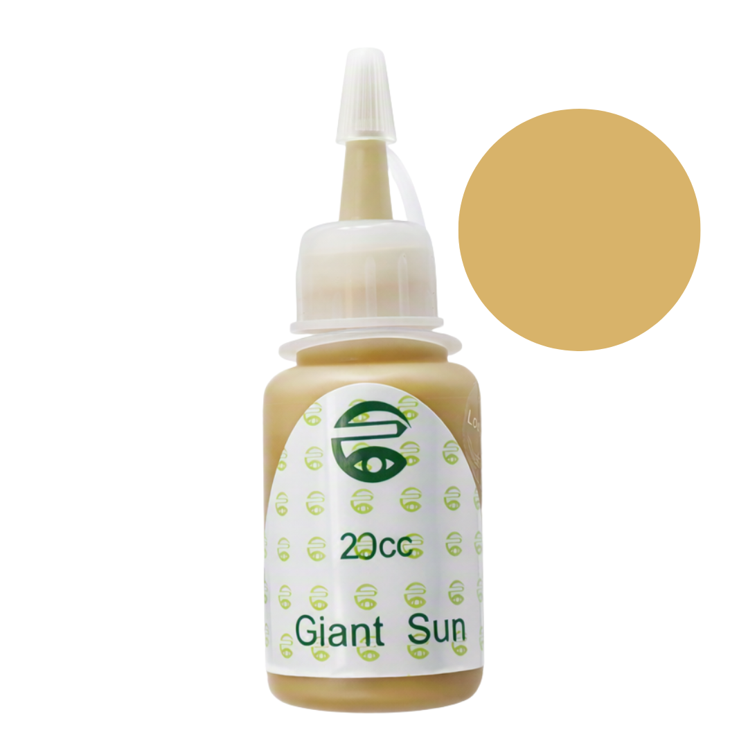 A 20cc bottle of Giant Sun pigment permanent makeup ink in a warm golden-beige shade, shown next to a matching circular color swatch on a plain white background.
