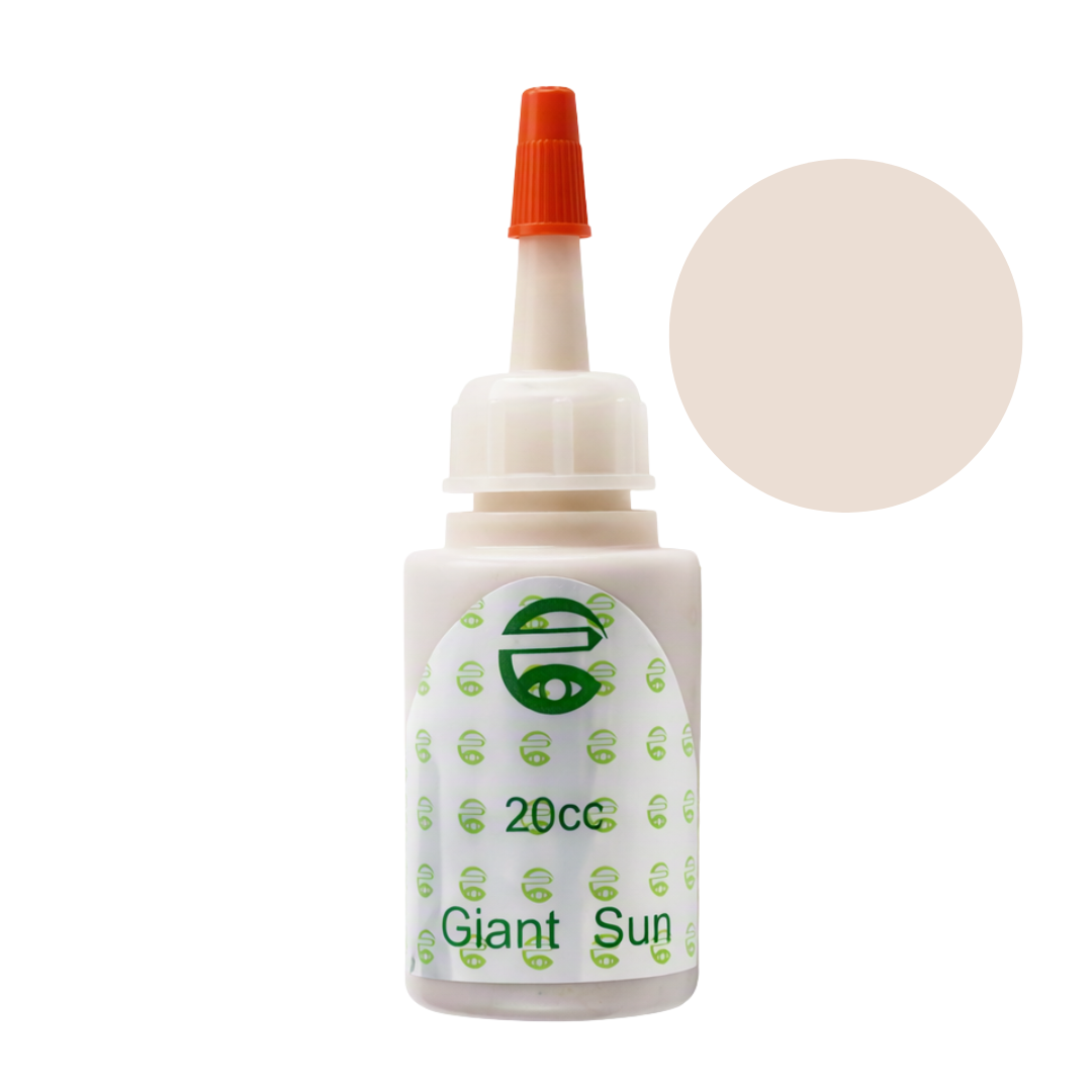 A 20cc bottle of Giant Sun white pigment permanent makeup ink with an orange cap, shown on a white background with a beige color swatch circle overlay.