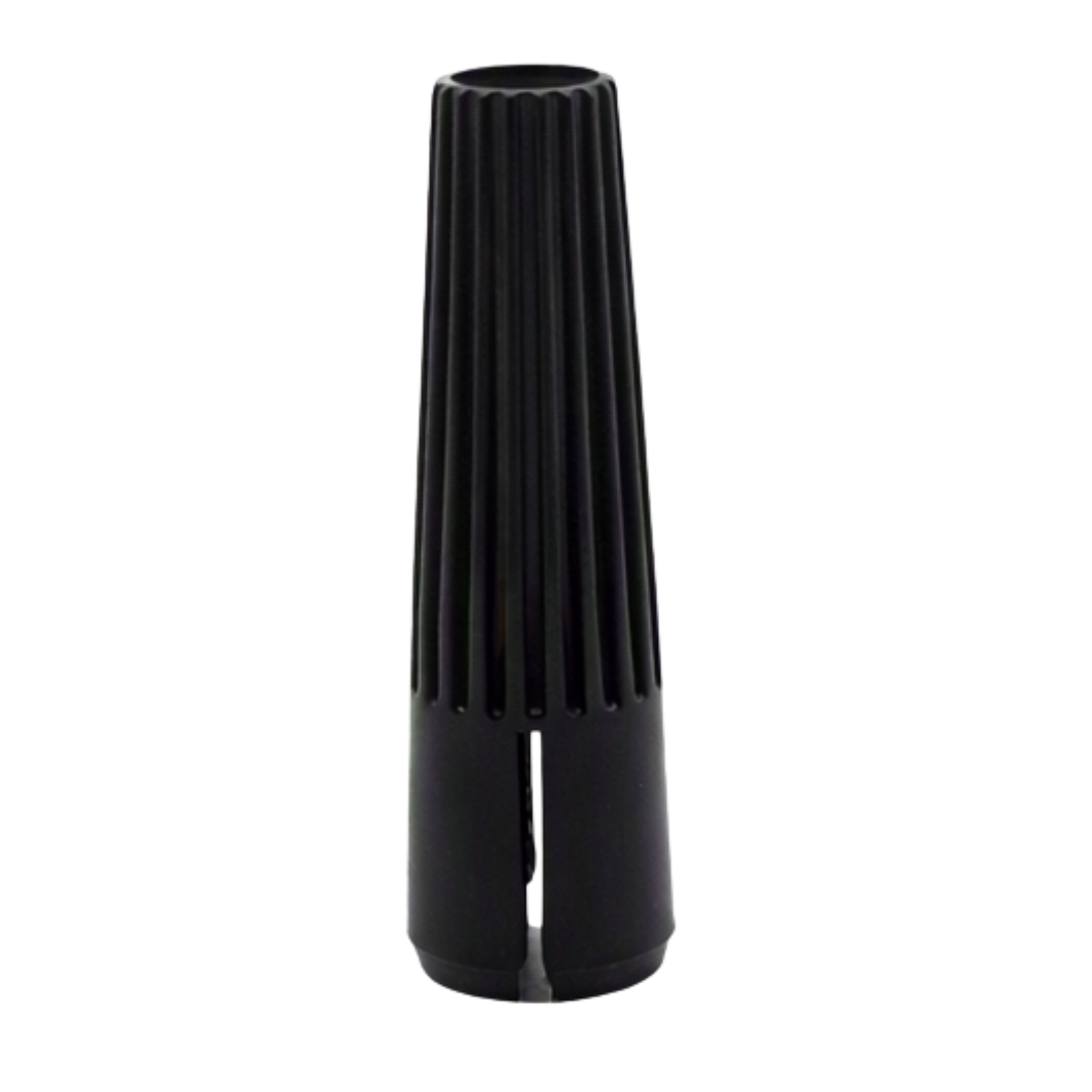 A black plastic permanent makeup needle sleeve standing upright, on a plain white background.