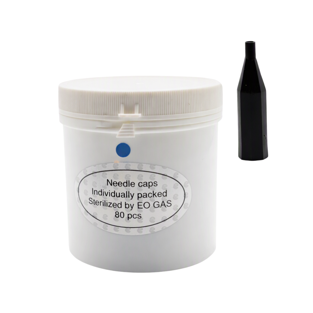 A white plastic jar labeled 'Needle caps Individually packed Sterilized by EO GAS 80 pcs' with a blue dot and a separate black needle cap shown beside it on a white background.