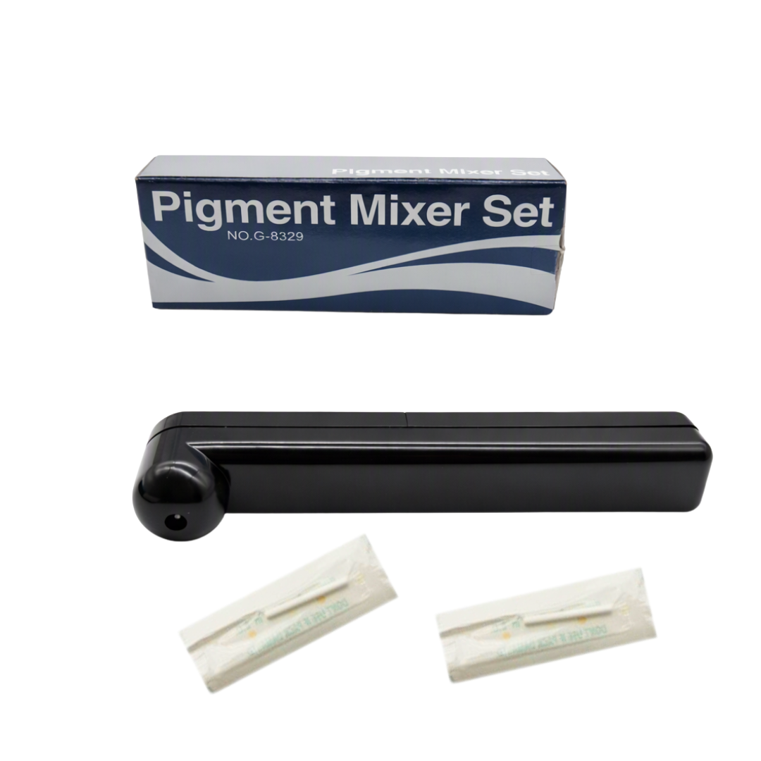 Pigment Mixer Set including a black plastic mixing paddle, blue and white branded box, and two small white packets, shown on a plain white background.