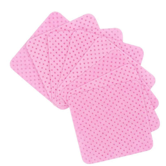 A set of five pink lint free nail or lash wipes with a small polka dot pattern, arranged in a fanned-out layout on a solid white background.