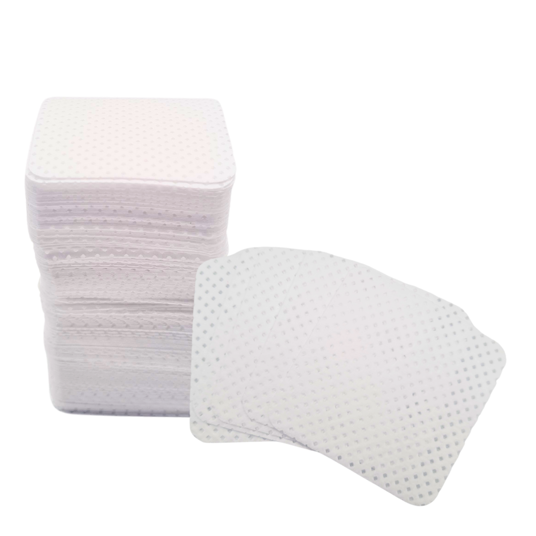 A stack of white, square, lint free pads with one pad fanned out in front on a plain white background.
