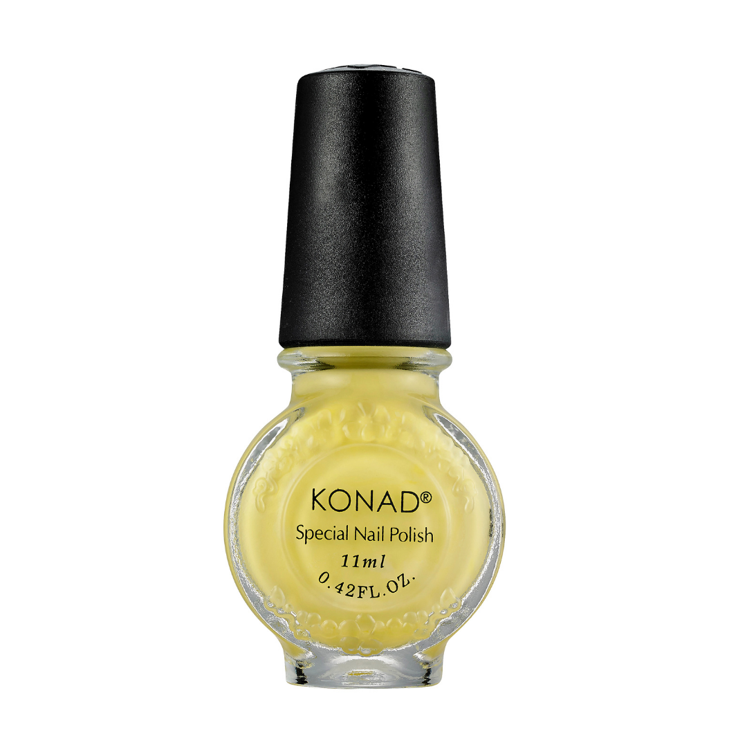 A bottle of Konad nail art stamping Polish in a pale yellow shade, featuring a textured clear glass bottle and a matte black cap, set against a plain white background.