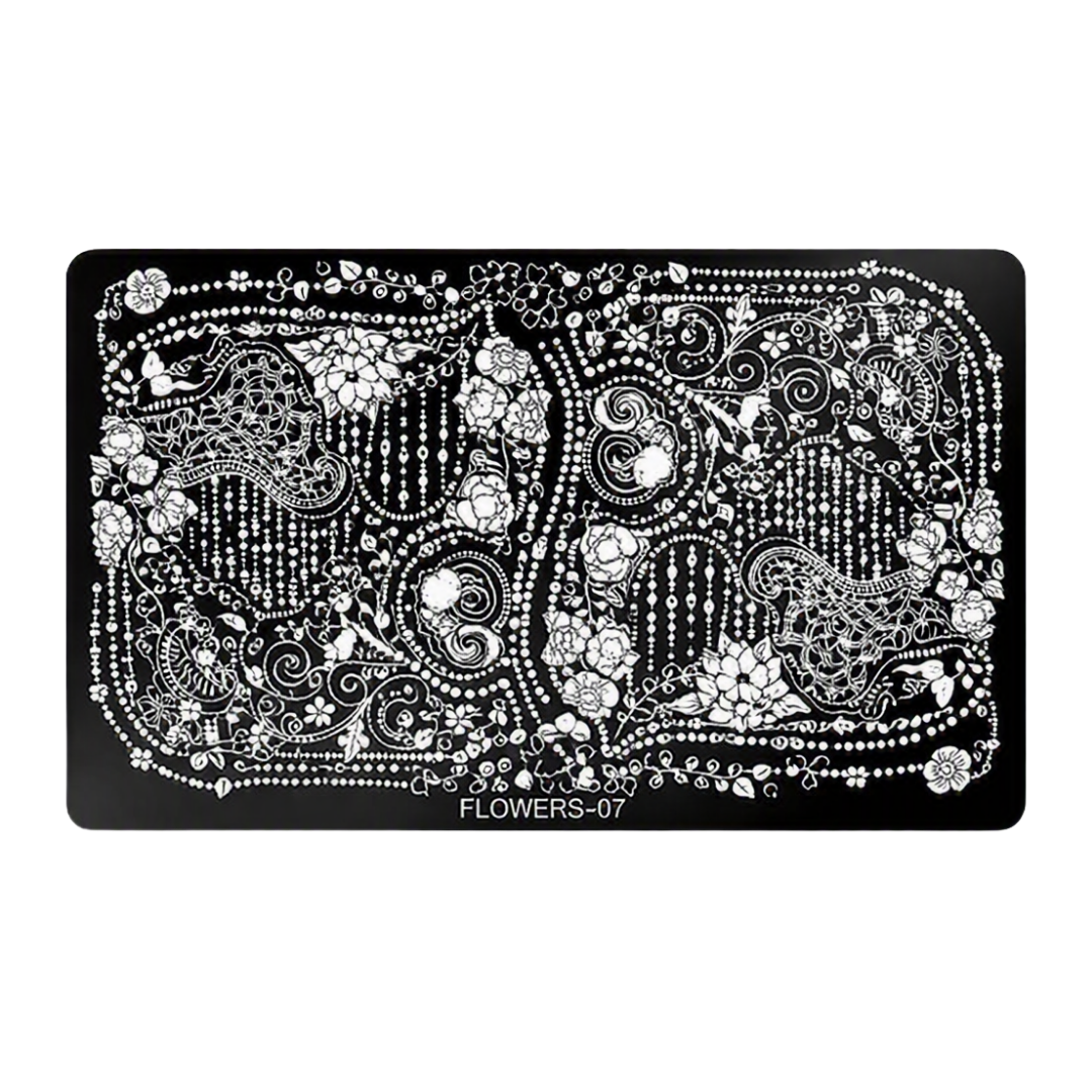 A rectangular black nail stamping plate with an intricate white floral and paisley pattern, labeled 'FLOWERS-07' at the bottom center, shown on a plain white background.