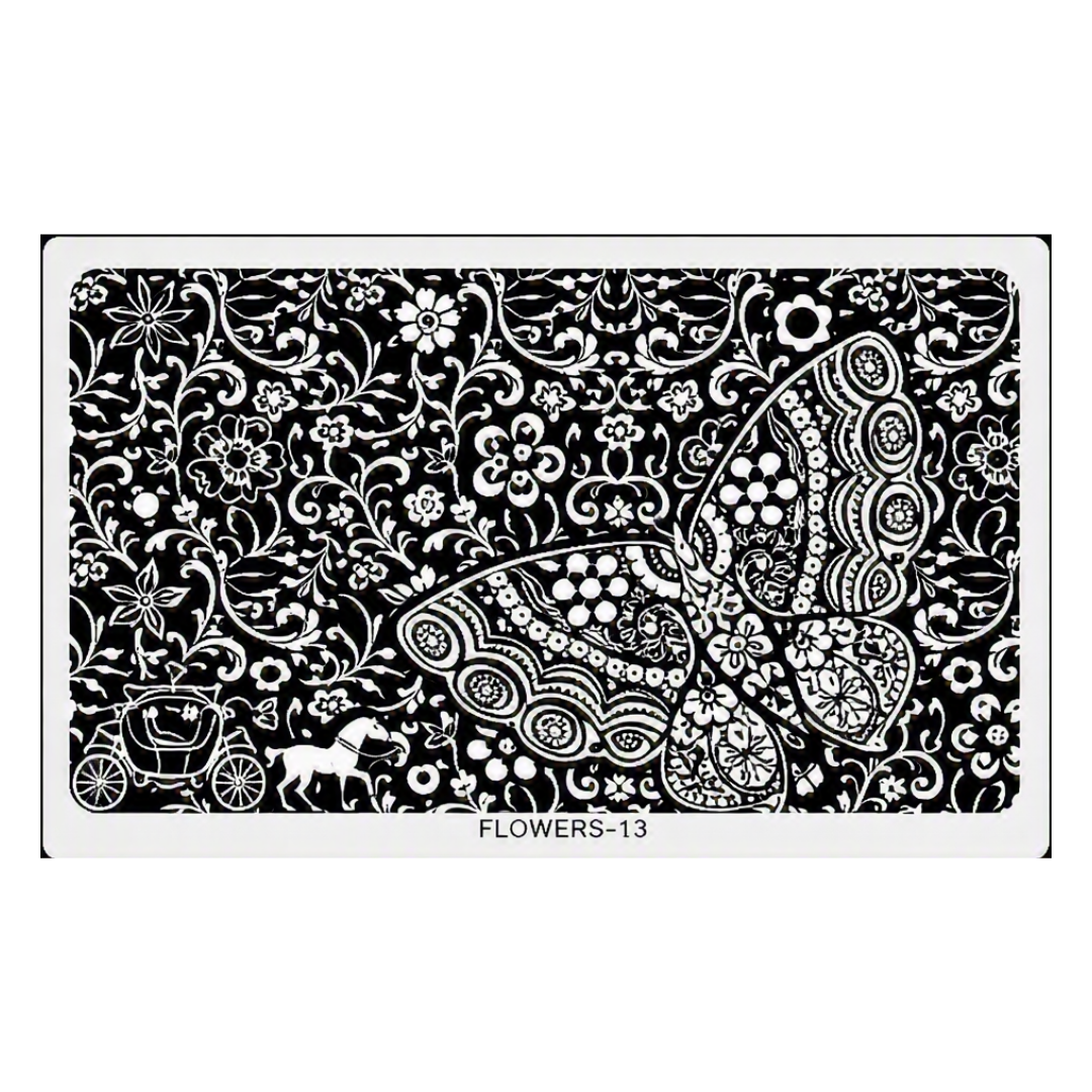 A rectangular black-and-white floral stamping plate or stencil design with an ornate damask pattern, a large butterfly motif, and small carriage and horse silhouettes. The text 'FLOWERS-13' appears along the bottom edge.
