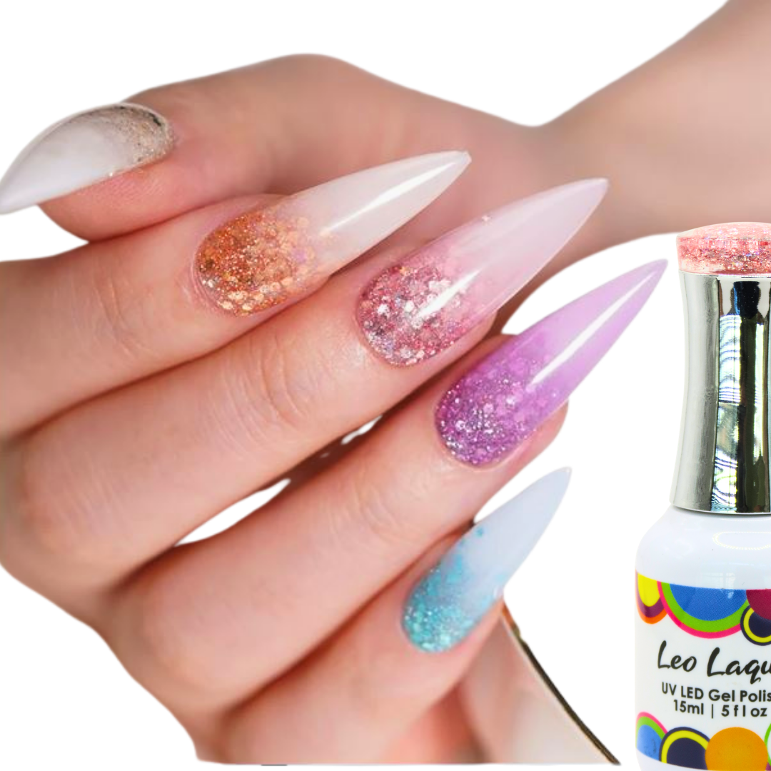 A hand with long stiletto-shaped nails painted in pastel gradient designs with glitter is shown next to a bottle of Leo Laque UV LED gel polish on a white background.