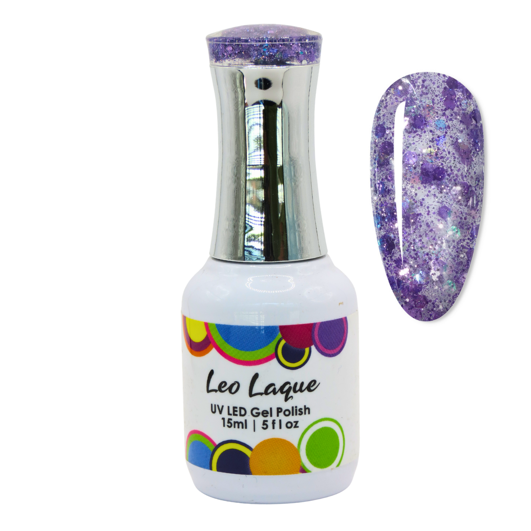 A bottle of Leo Laque UV LED gel polish with a silver cap and a white label, shown next to a nail swatch displaying a purple glittery nail finish on a white background.