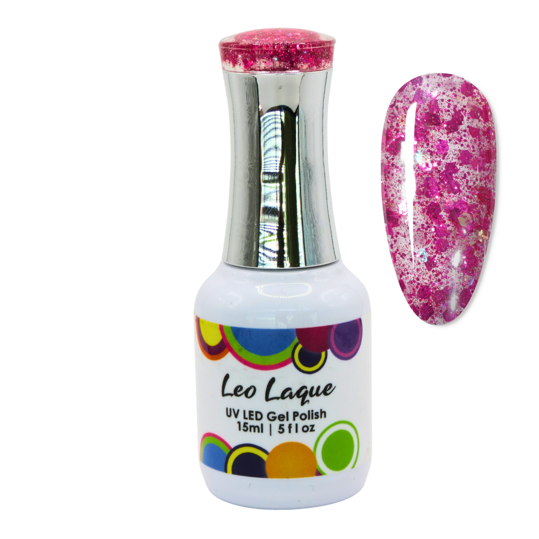 A bottle of Leo Laque UV LED gel nail polish with a silver cap and a white label, shown next to a nail swatch displaying a pink glittery pattern.
