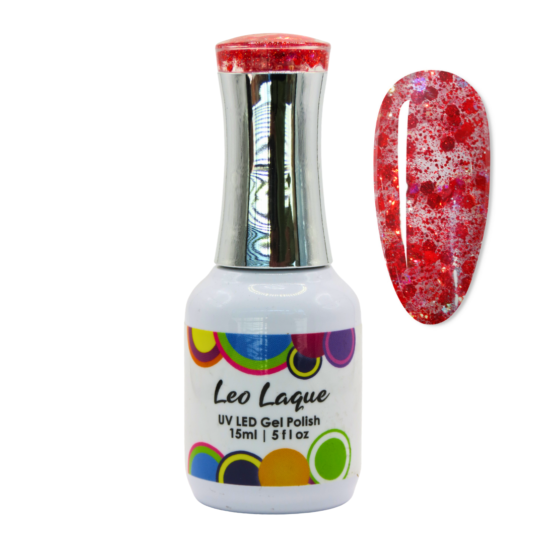 A bottle of Leo Laque UV LED gel polish with a silver cap and a white label, shown next to a nail swatch displaying a red and white glitter pattern.