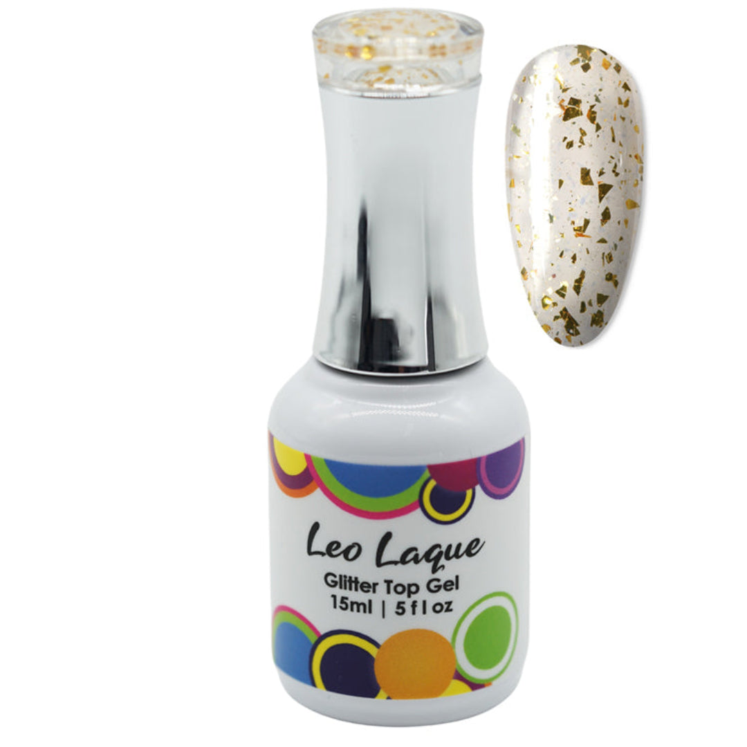 A bottle of Leo Laque Glitter Top Gel nail polish with a silver cap and a white label featuring colorful circles, shown next to a nail tip swatch displaying the glittery gold-on-clear top-coat.