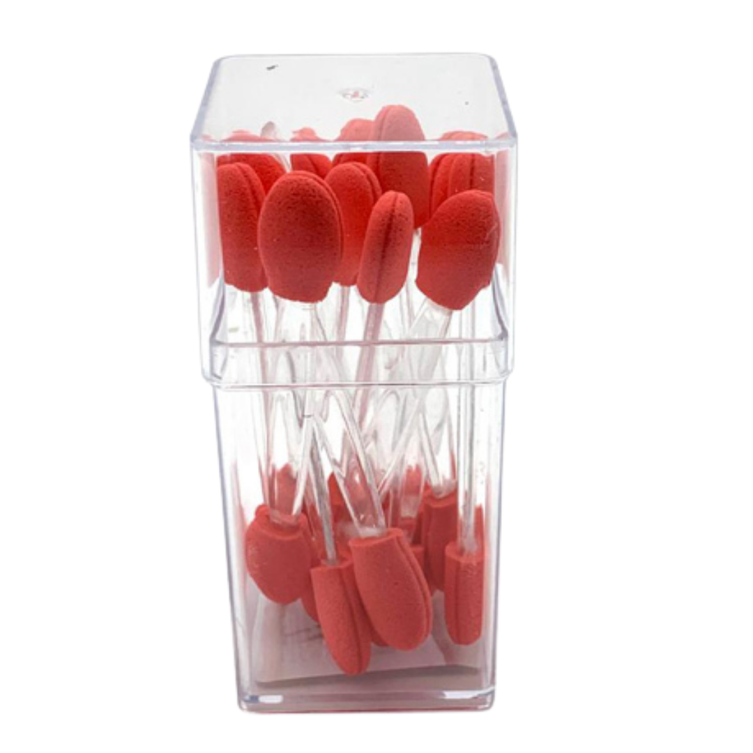 A set of red foam makeup sponge tips in a clear plastic storage container, photographed against a plain white background.